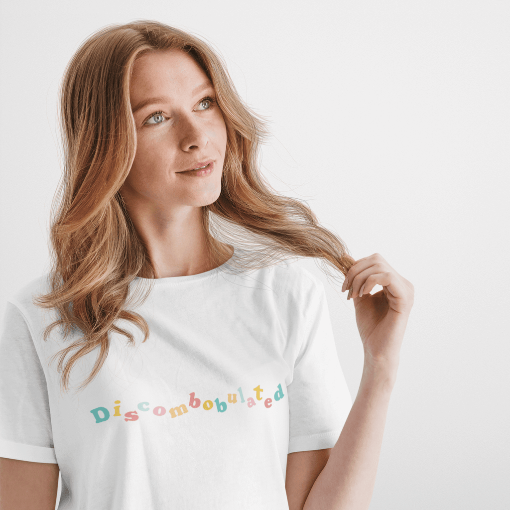 Woman with faraway look wearing a wit and wisdom discombobulated slogan tshirt