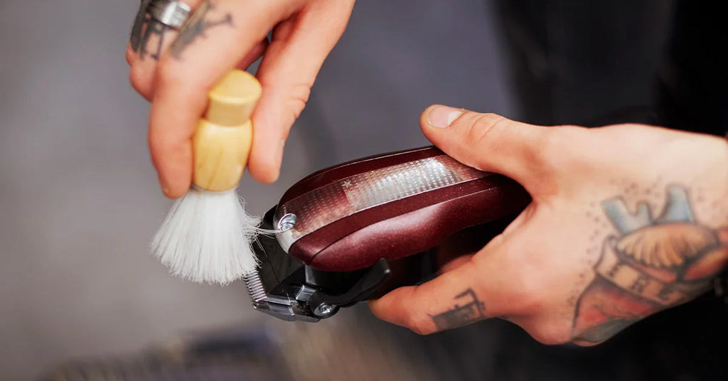 Man Holding Shaver And Brush