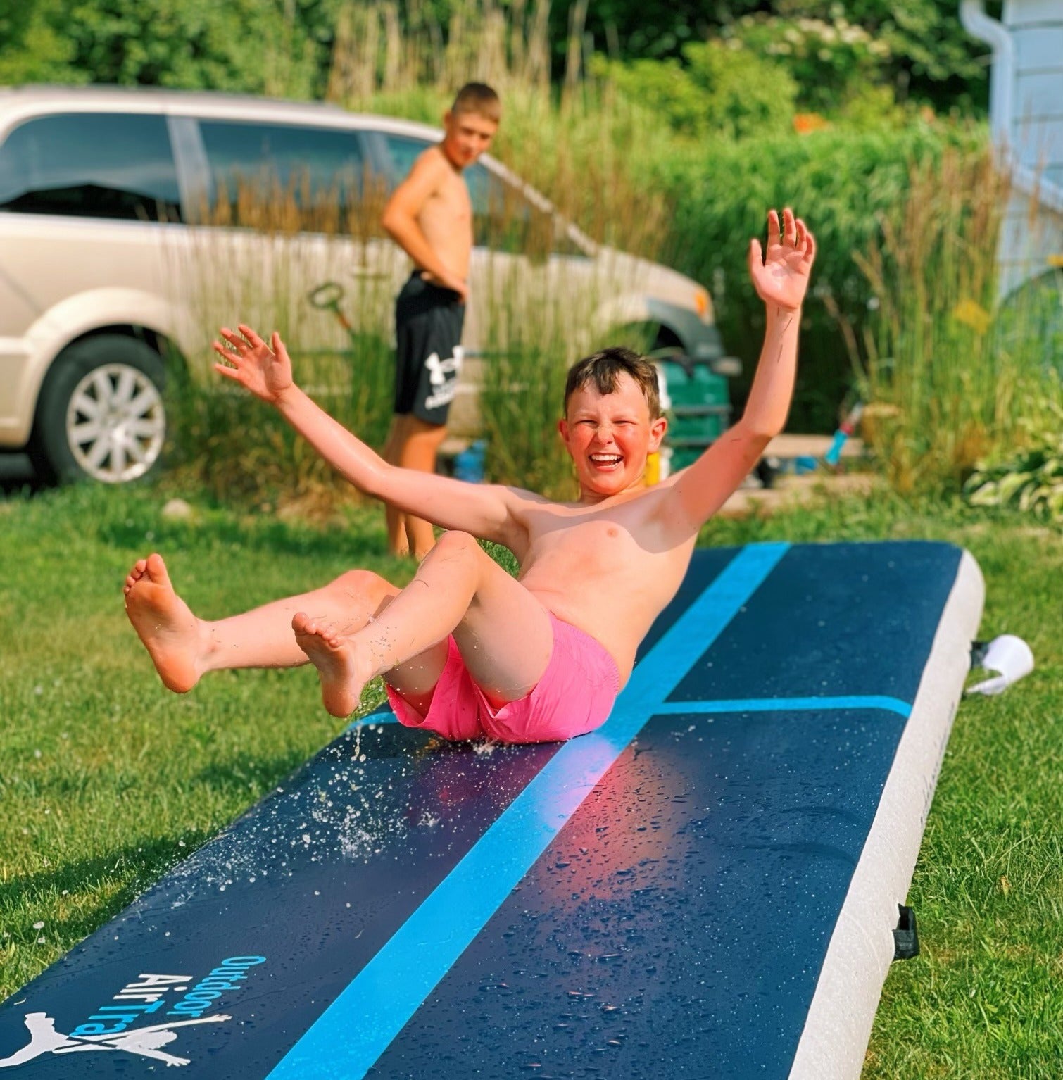 Boy slip-n-sliding