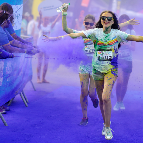 Someone running a Colour Run in Canada