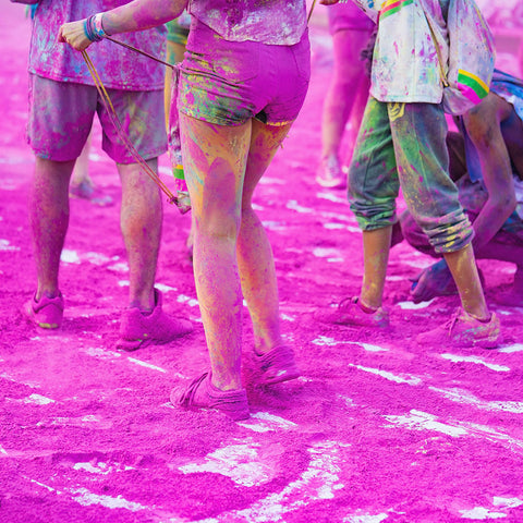 People walking in Pink Colour Powder