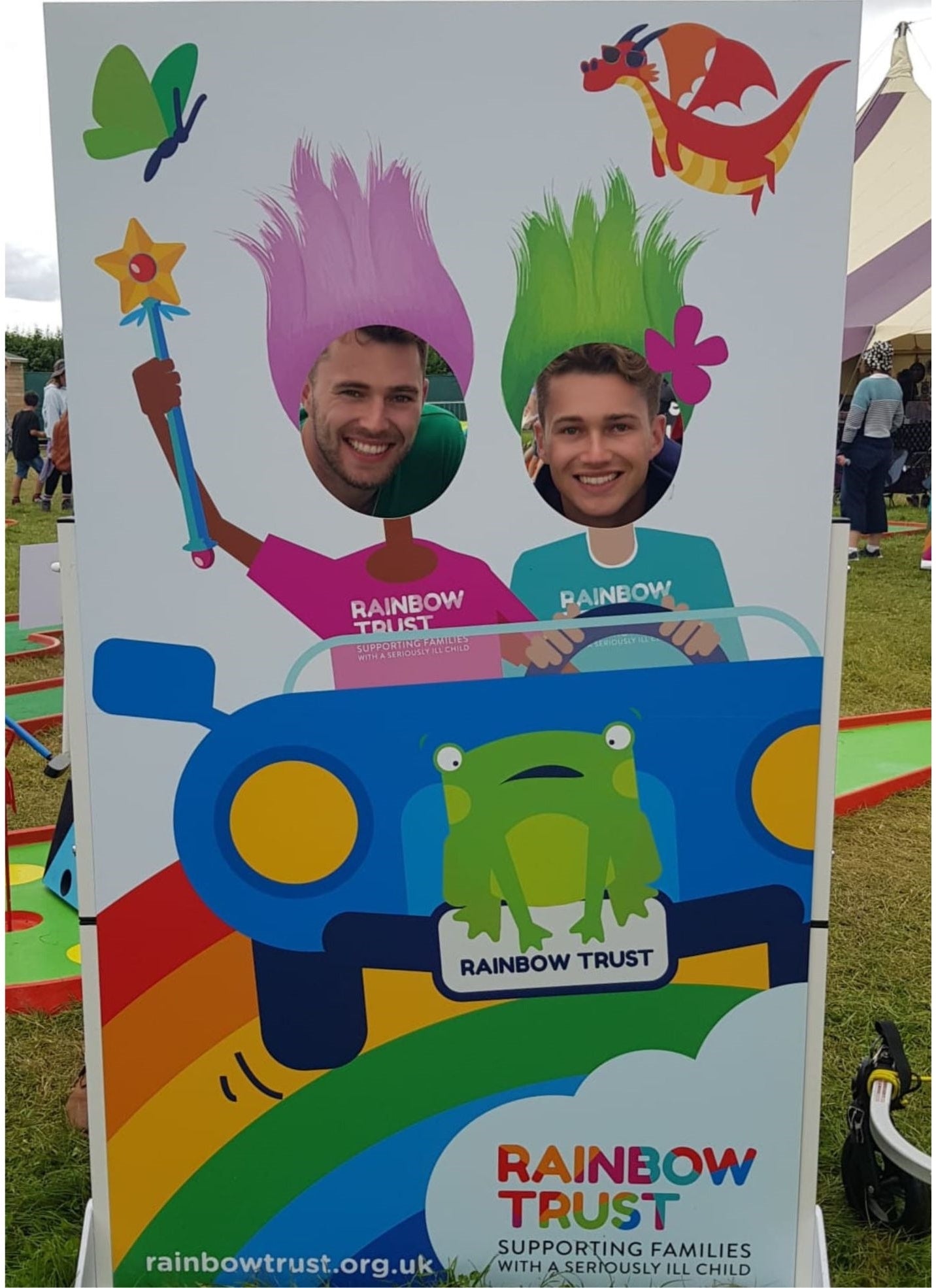 Reality TV Stars Posing in Rainbow Trust Photo Board