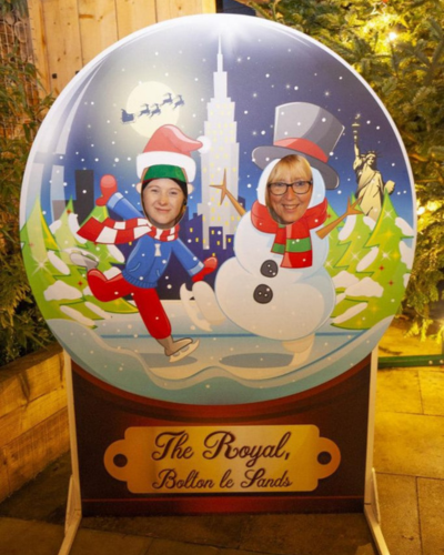 Pub used branded Snow Globe photo cutout to engage with customers