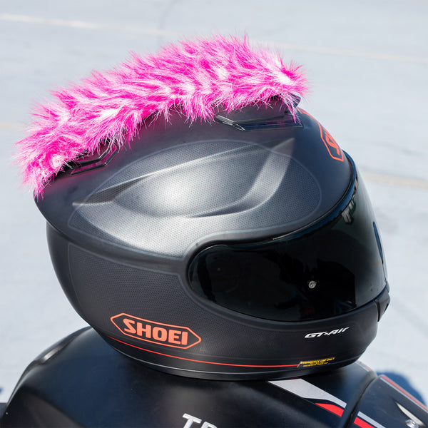 motorcycle helmet with pink mohawk