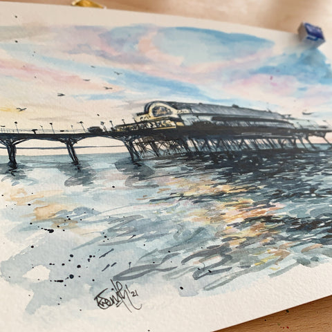 A watercolour painting of Cleethorpes Pier by Grimsby artist, Eve Leoni Smith.