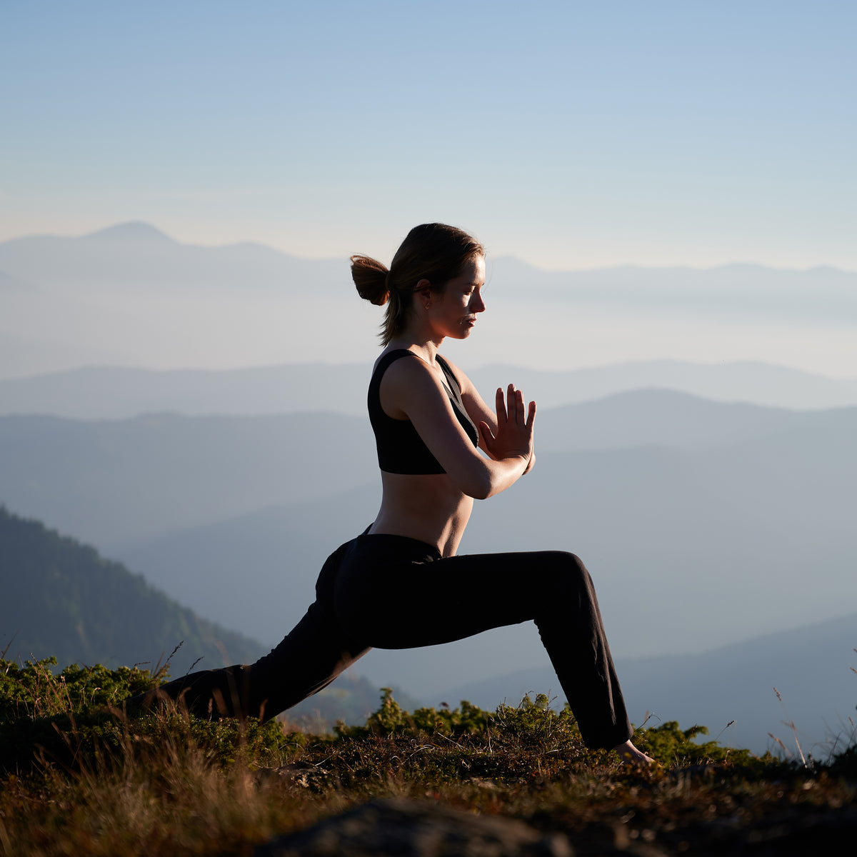 sporty-young-woman-practicing-yoga-mountains.jpg__PID:f19767d0-2a0b-408d-87e0-aa8461bb3f94