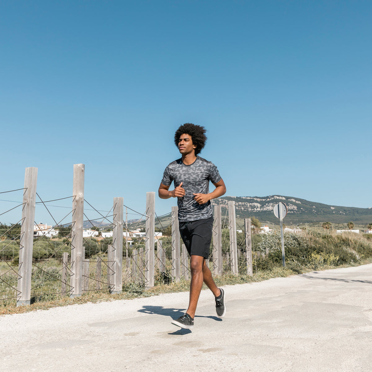 young-african-man-running-along-road.jpg__PID:9767d02a-0b60-4d47-a0aa-8461bb3f9412