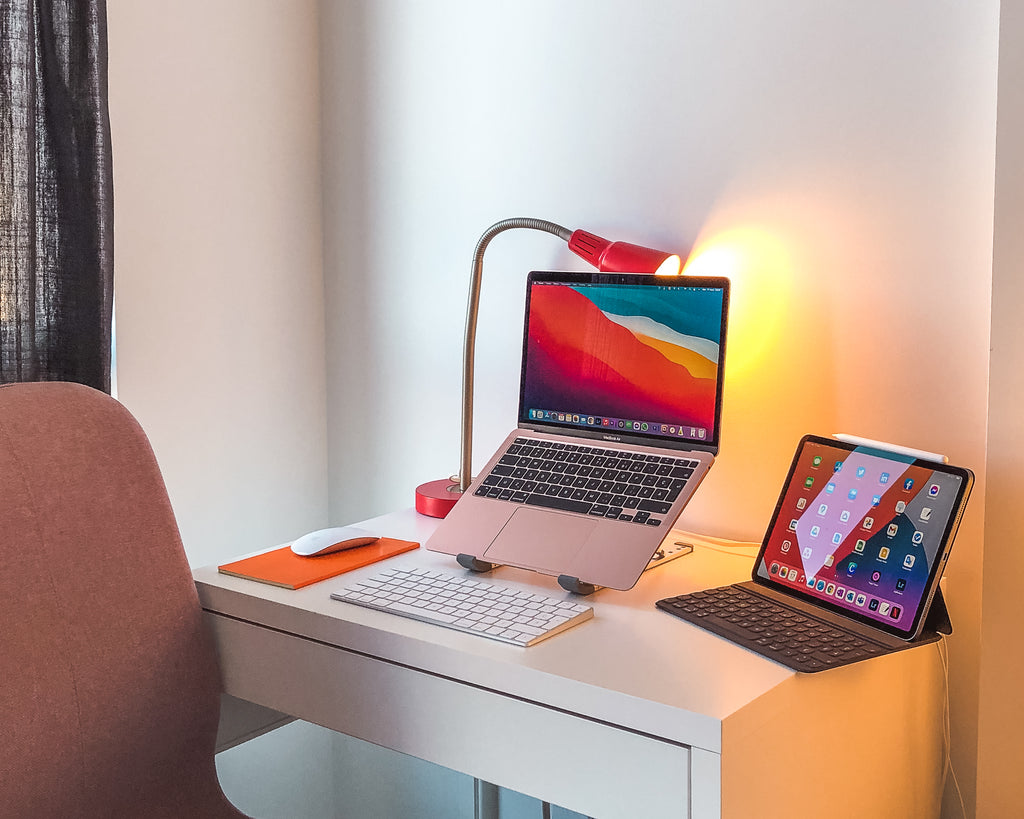 clutter-free desk ipad and macbook