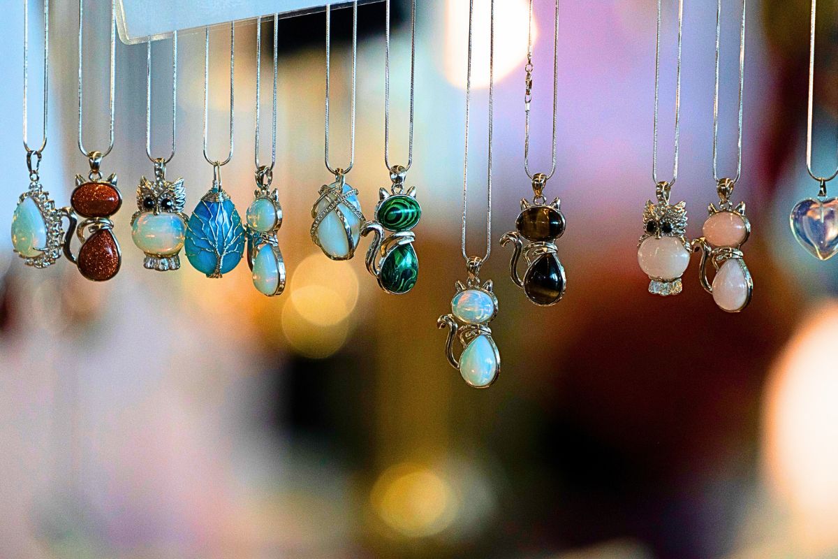 A beautiful collection of pendants made from costume jewelry.