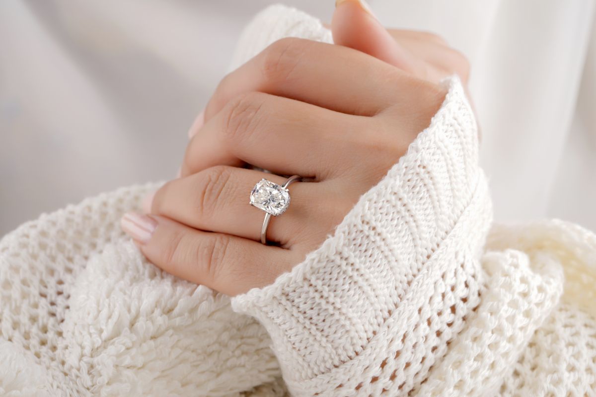 A lady wearing 3.5 carat diamond ring.
