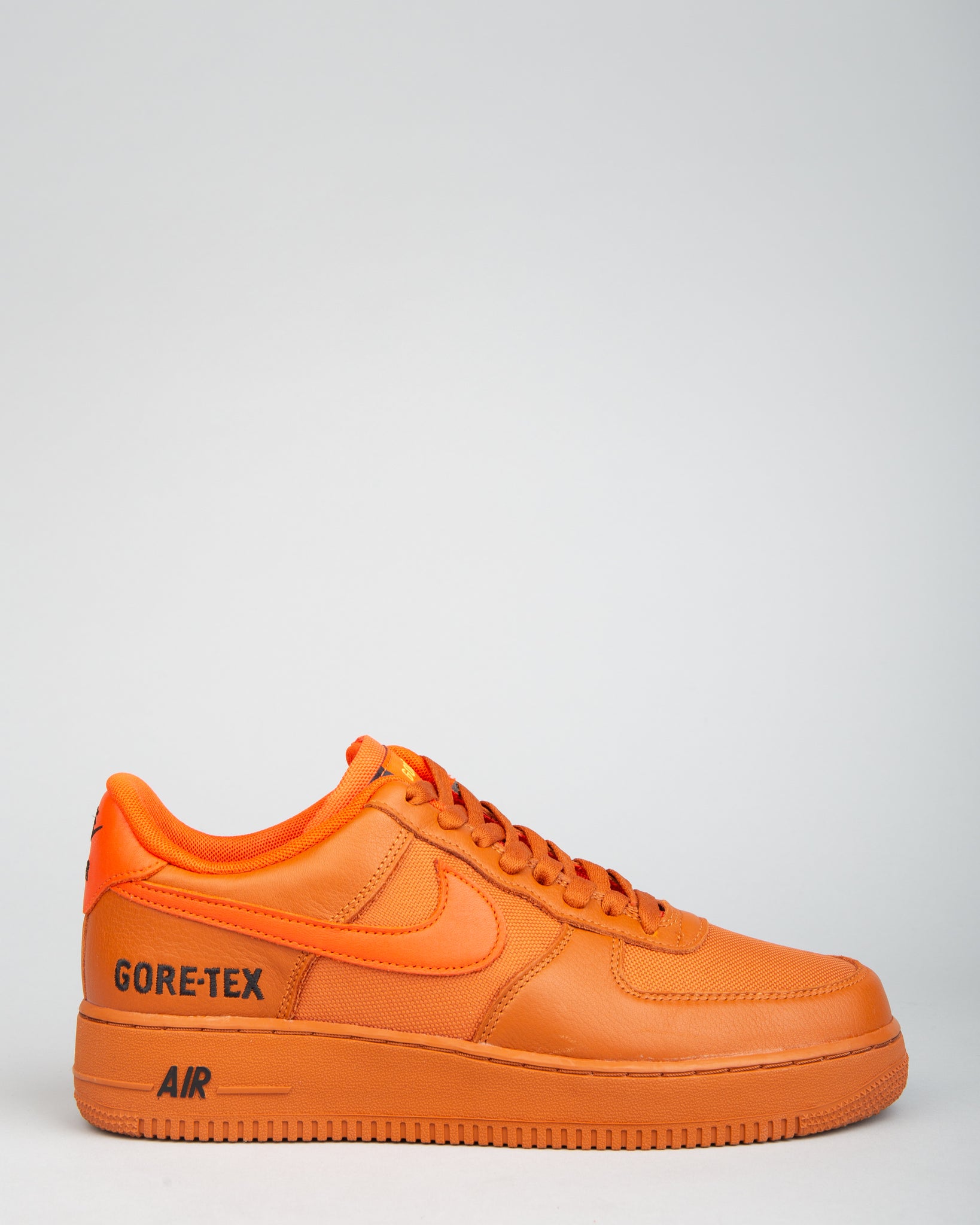 orange and black air force 1s