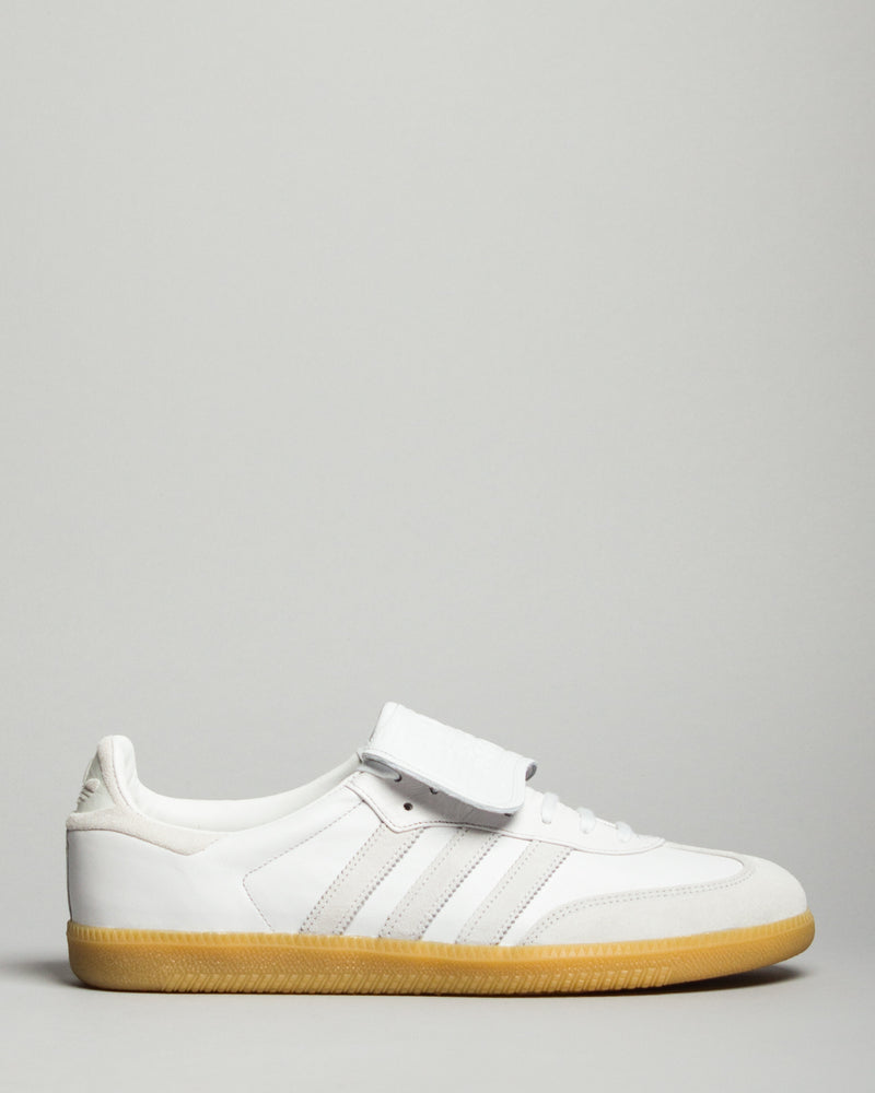 white and black adidas samba