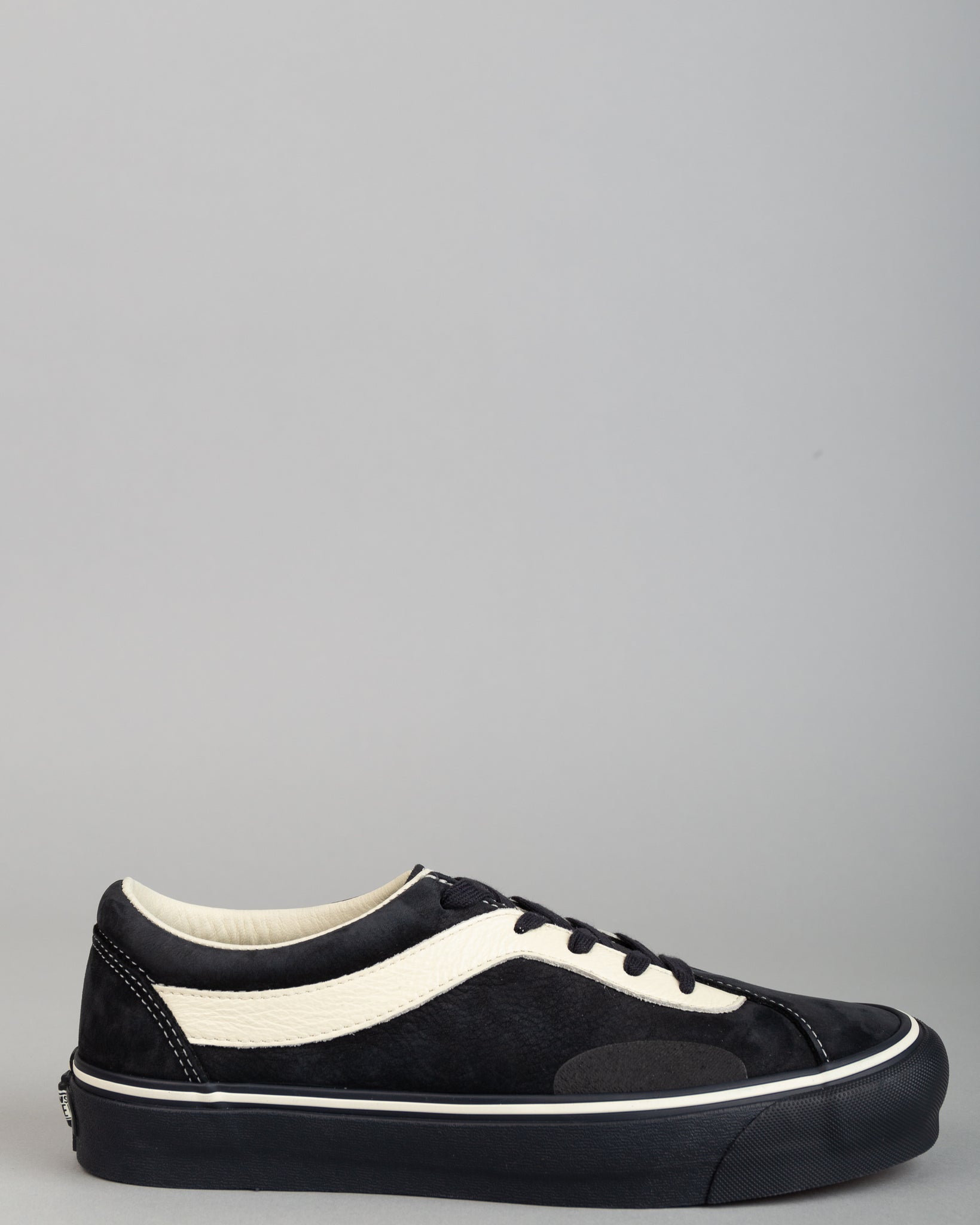 black vans with white writing