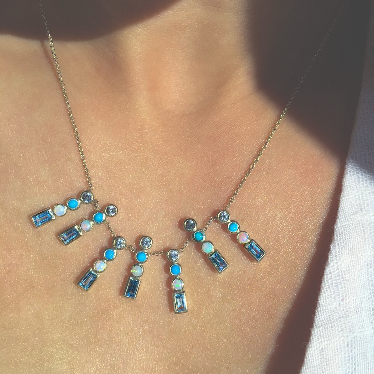 SHADES OF BLUE CIRCLE SHORT SEPTET NECKLACE