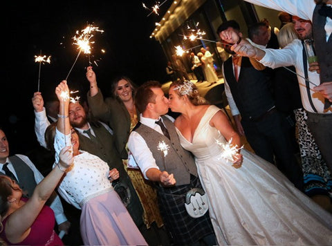 fireworks and sparklers bride and groom