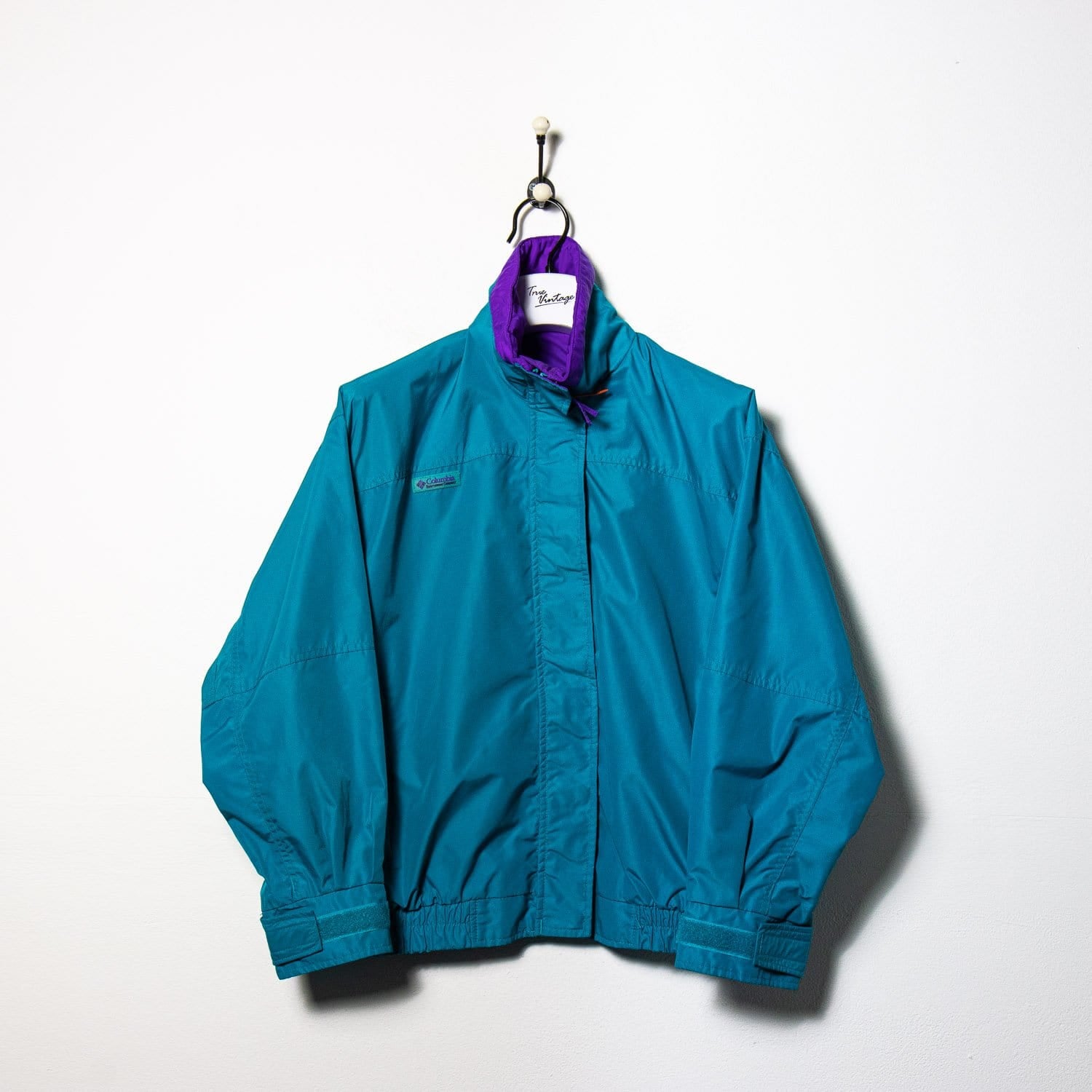 purple and turquoise jacket