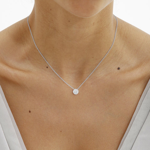 D-F Colorless Halo Pendant is a circle of sparkle and elegance.