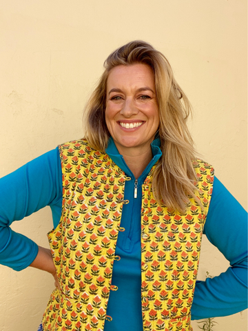 Amelia McFarlane wearing Woolerina's 1/4 zip top in turquoise