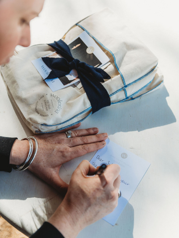 Woolerina packs orders with a handwritten note