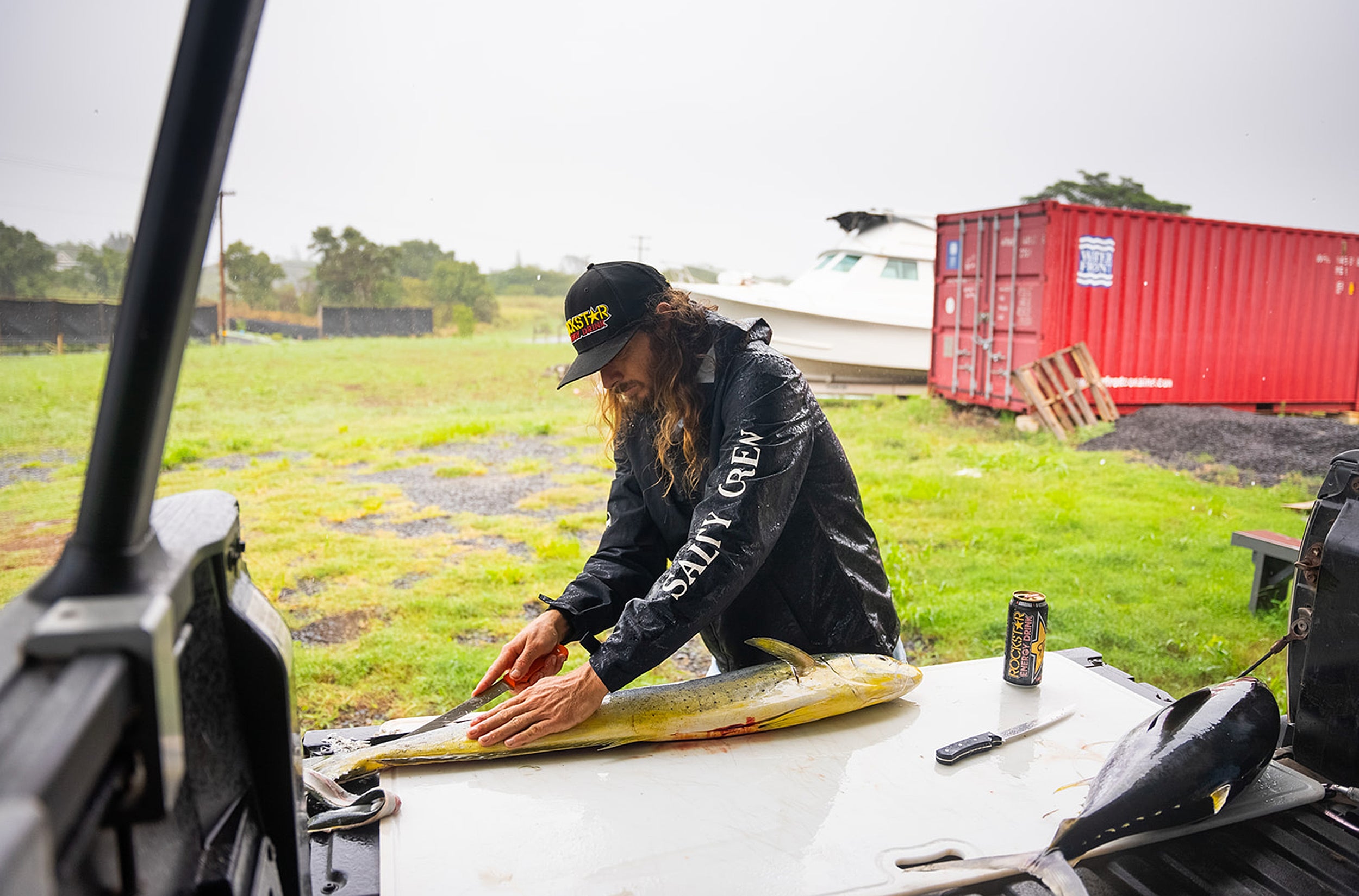 Matt Meola cutting fish - Salty Crew