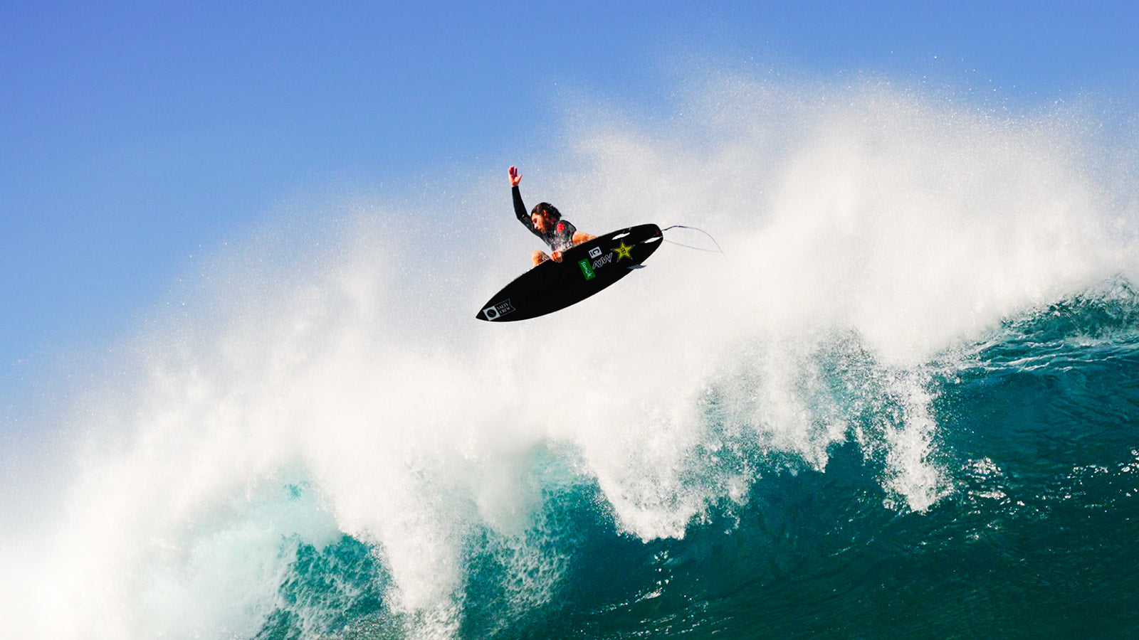 Matt Meola surfing air photo by Jon Spenser