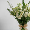 White Lisianthus Roses Bouquet With Eucalyptus In Glass Vase
