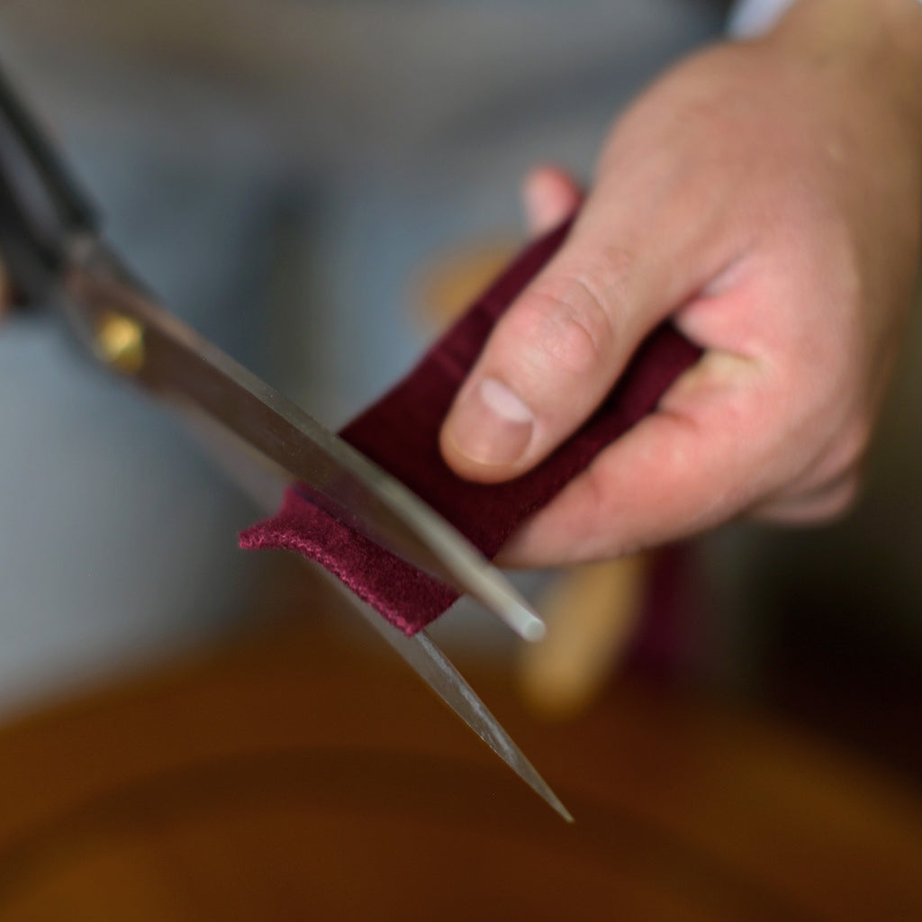 Then, cut along the line. Scissors with a rounded blade, such as nail scissors, can come in handy