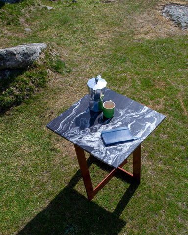 The Capri Side Table with a Forest Black Granite table top