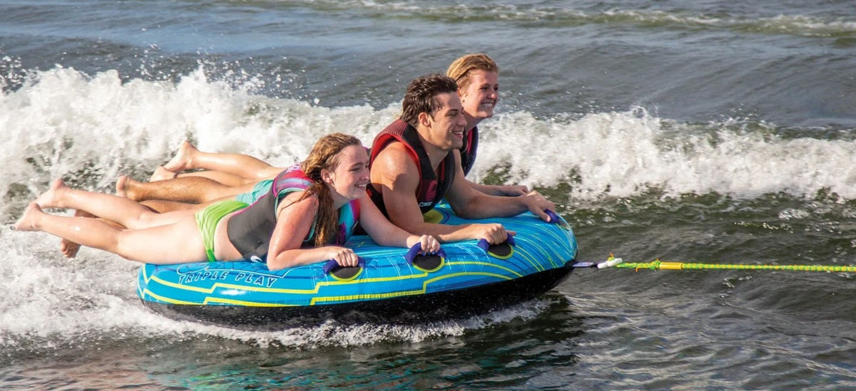 Connelly boat tube towed with three riders