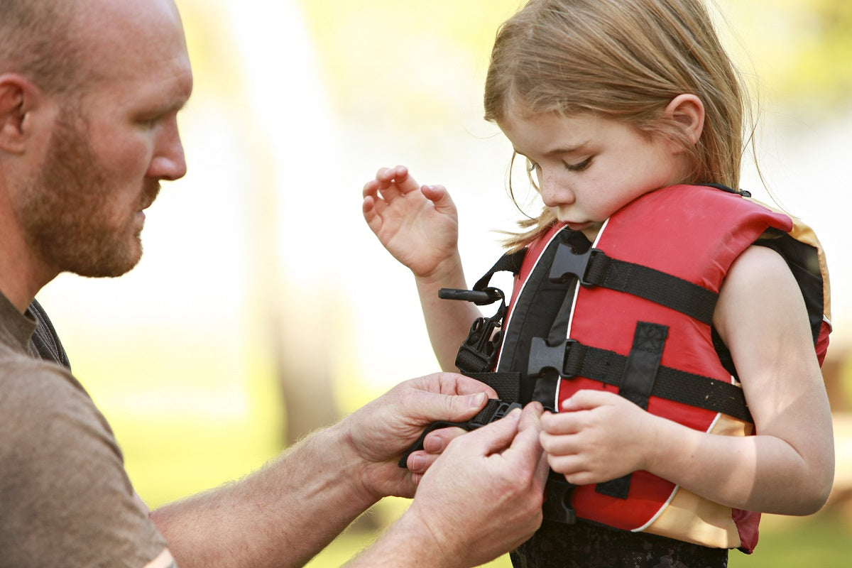 Fitting a child's life jacket