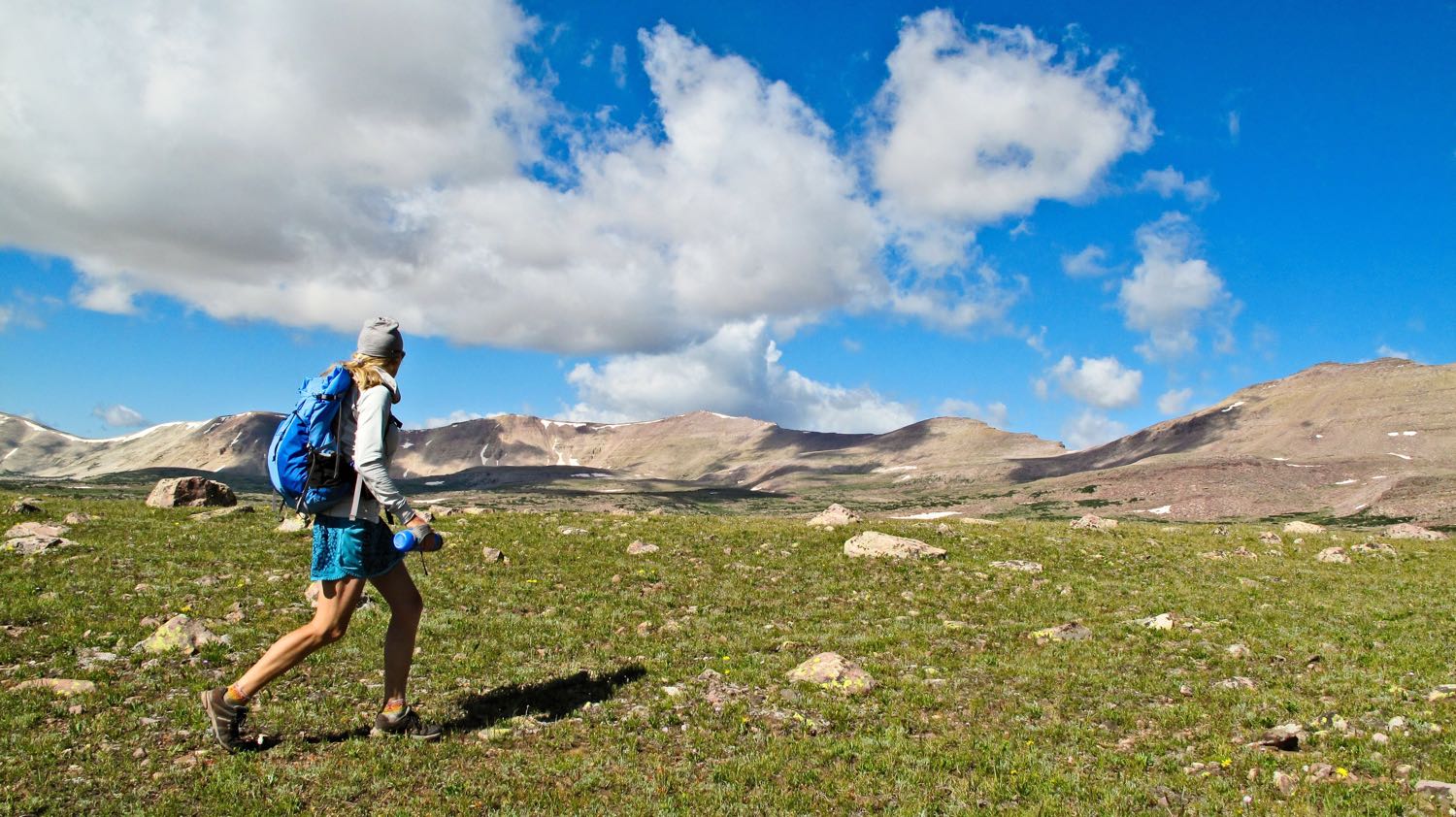 Ultrarunner Sarah McCloskey searches for lynx in the Uinta Mountains, Utah. 