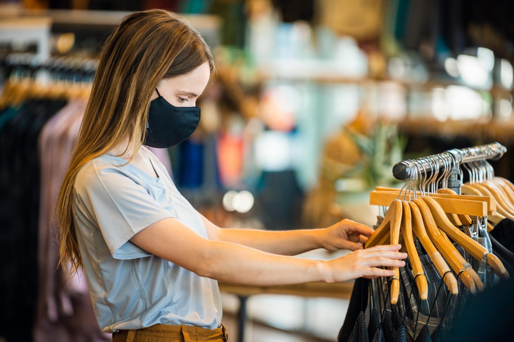 A shopper wears the Outdoor Research Face Mask.