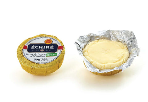 2 Echire Salted Butter Cup, one wrapped, the other open, front view.