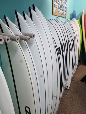 Surfboard for Winter - Row of Surboards in a Store
