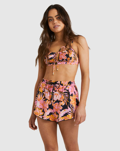 Brunette model wearing Billabong Copacabana swim shorts and bikini top