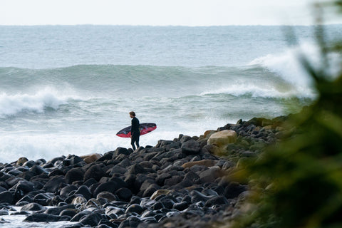 O'Neill sponsored surfer going surfing in winter