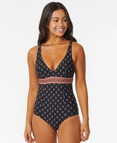 Dark-haired model wearing Rip Curl Pacific Dream D-DD onepiece swimsuit