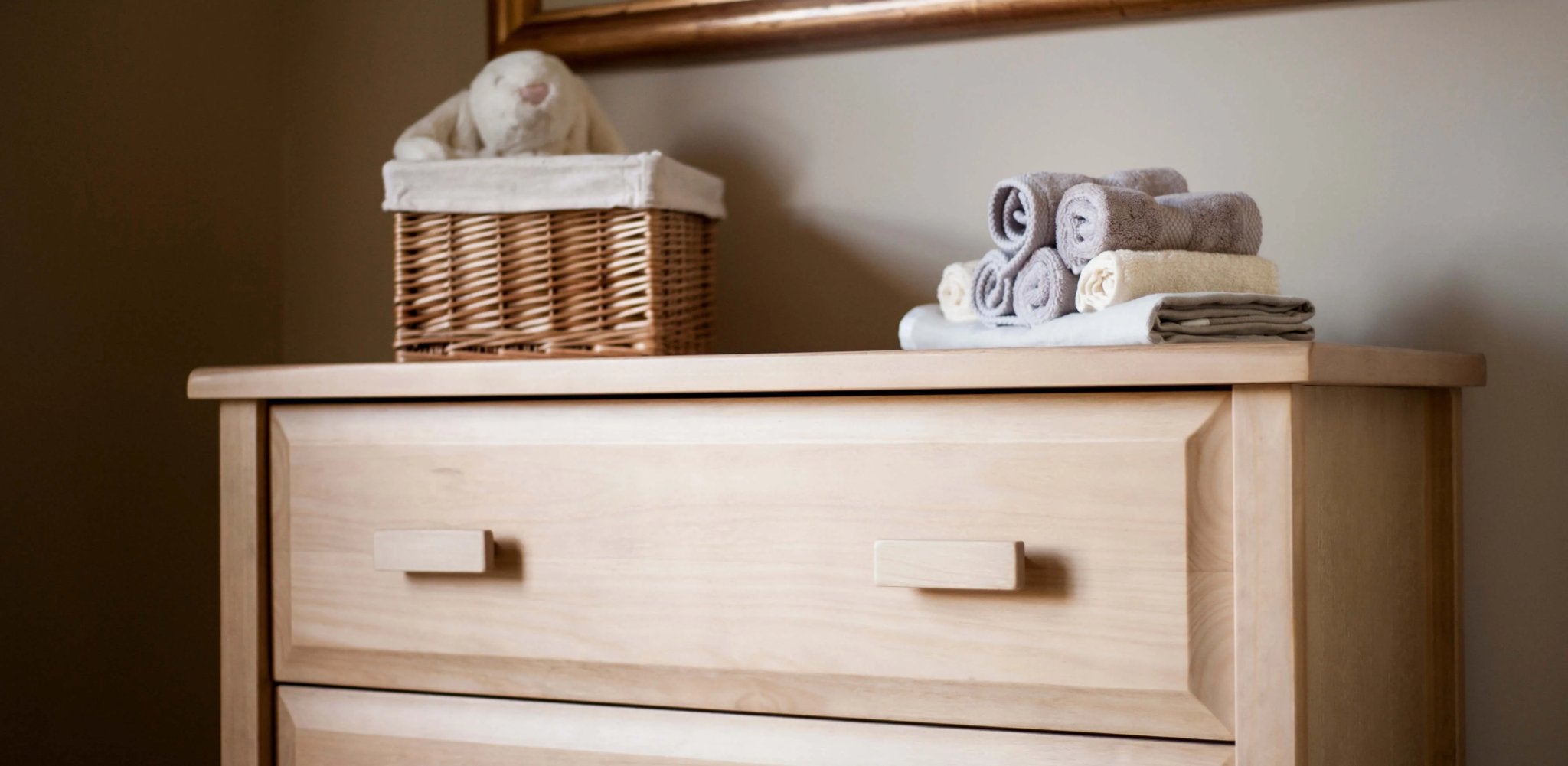 wooden dresser with accessories on top