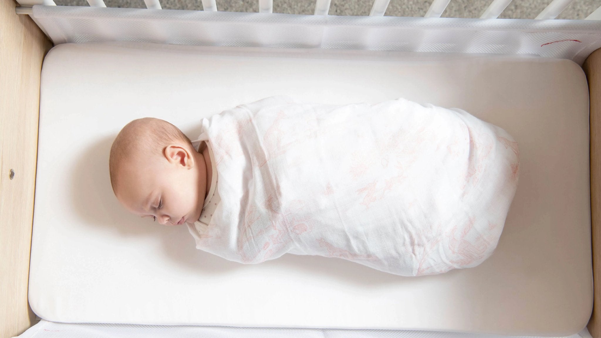 baby swaddled in muslin cloth