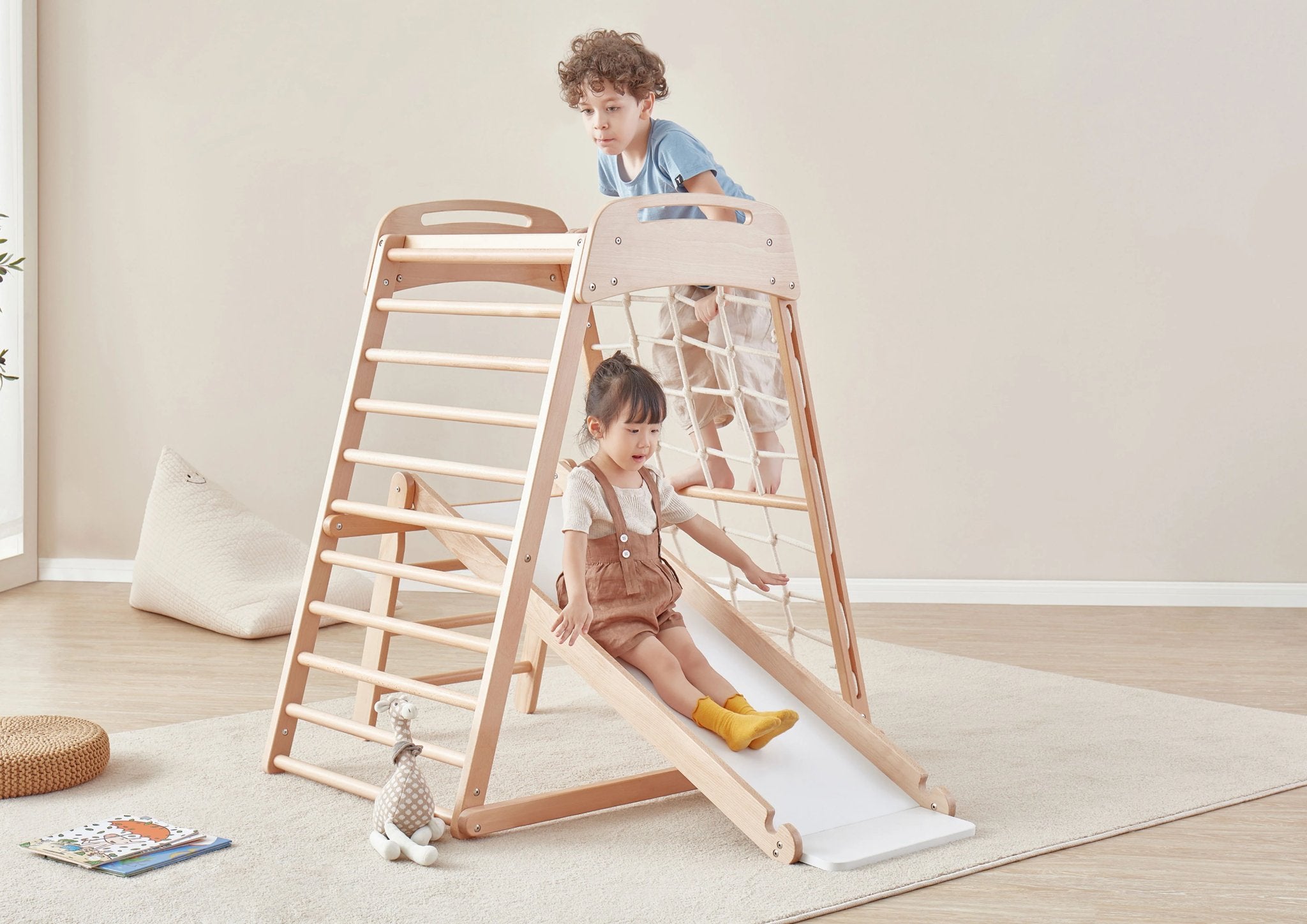 children play on indoor climbing gym