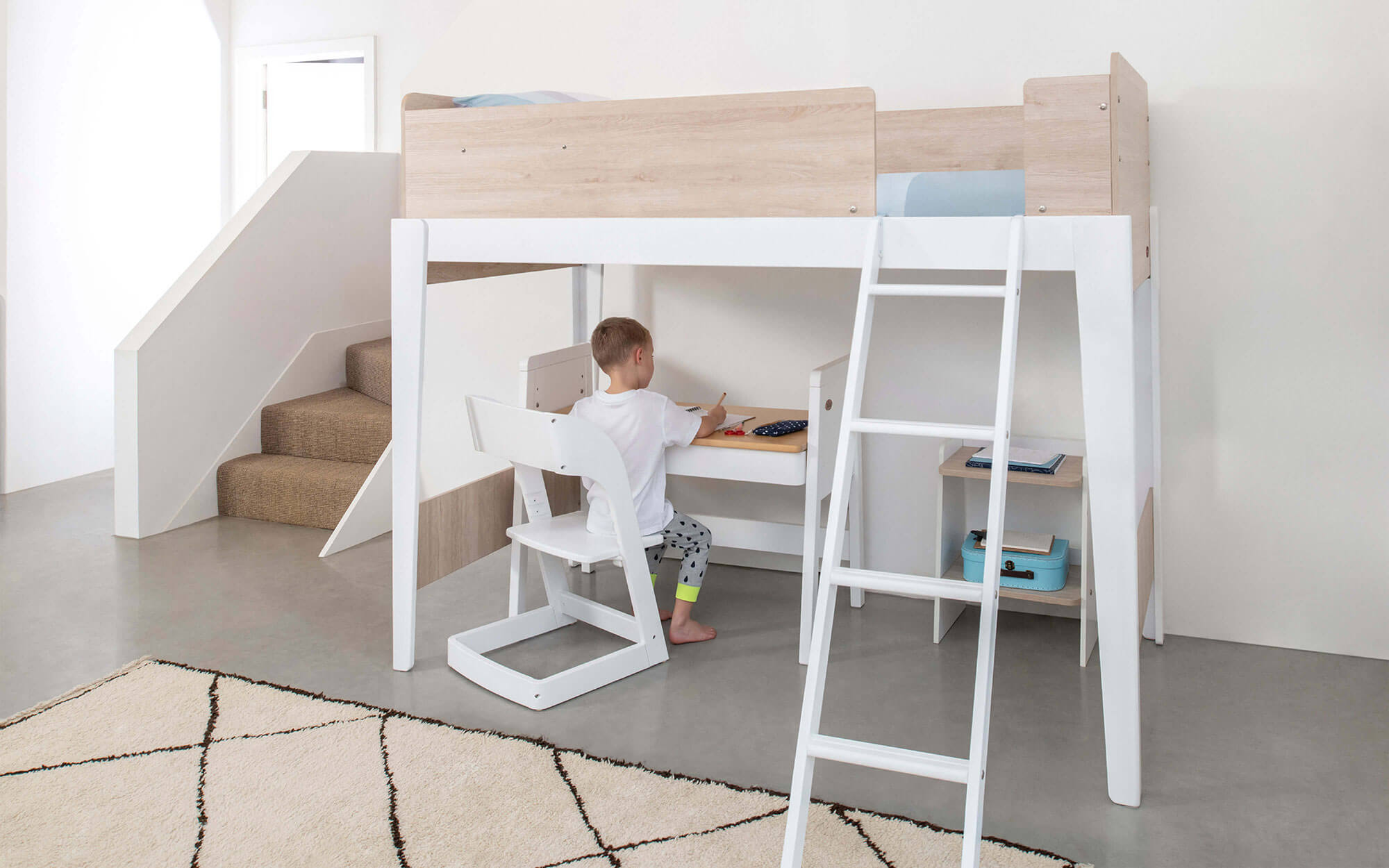 Child at desk under Natty Single Loft Bed