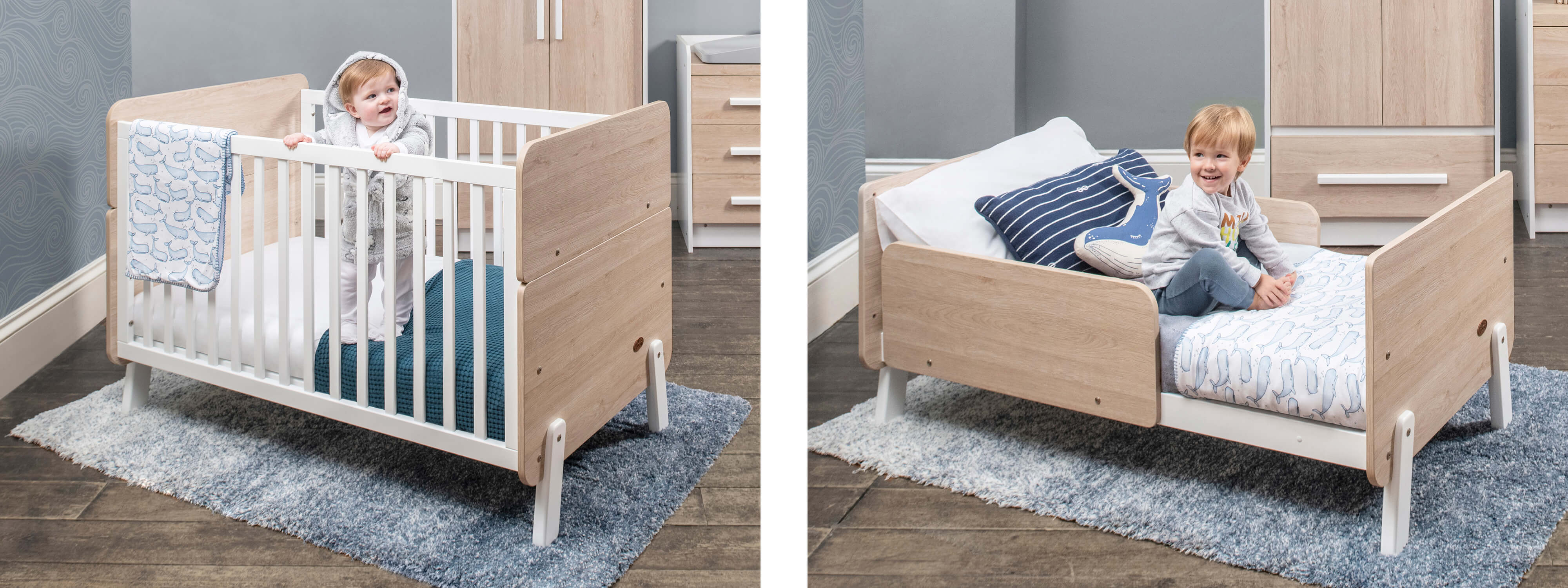 cot that turns into toddler bed in blue nursery
