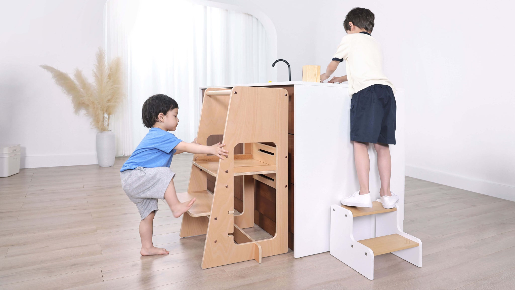 Child climbing learning tower