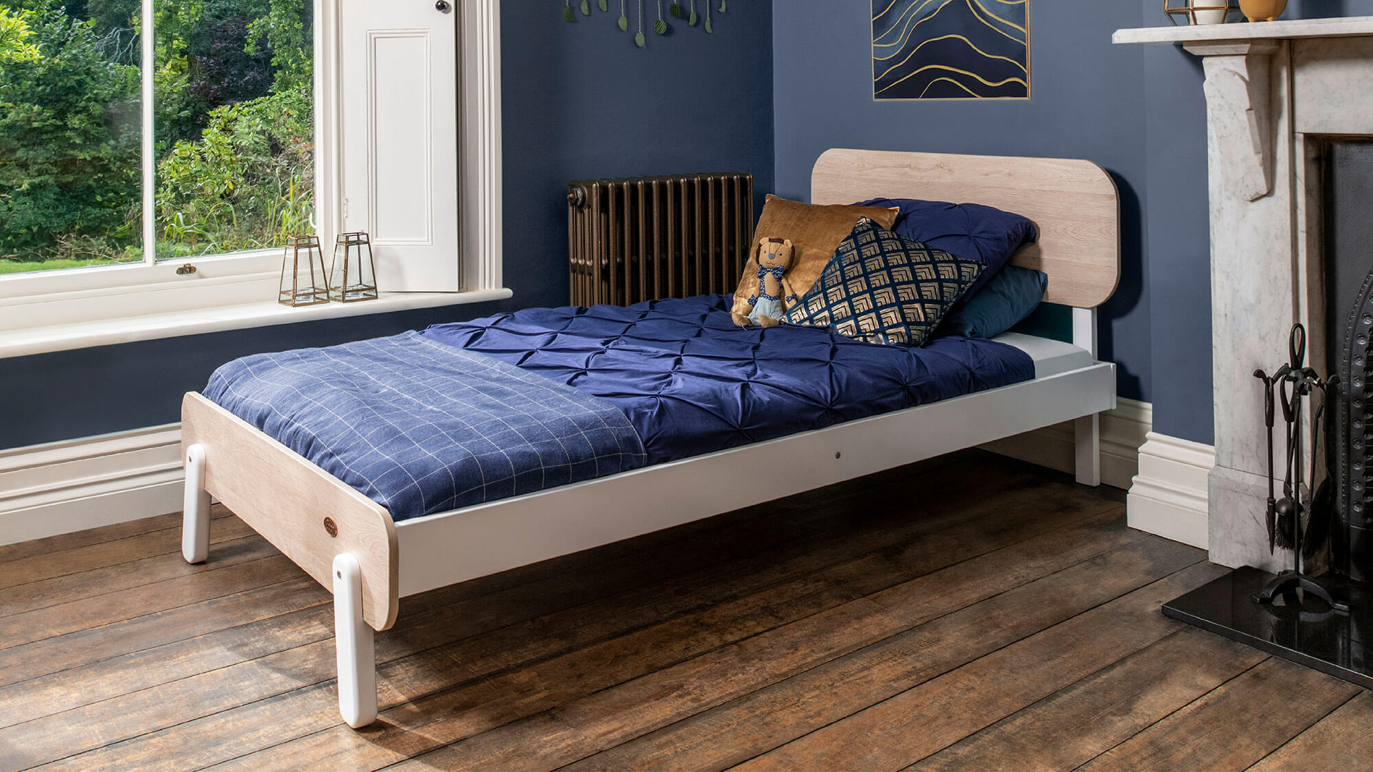 Natty King Single Bed with navy decor