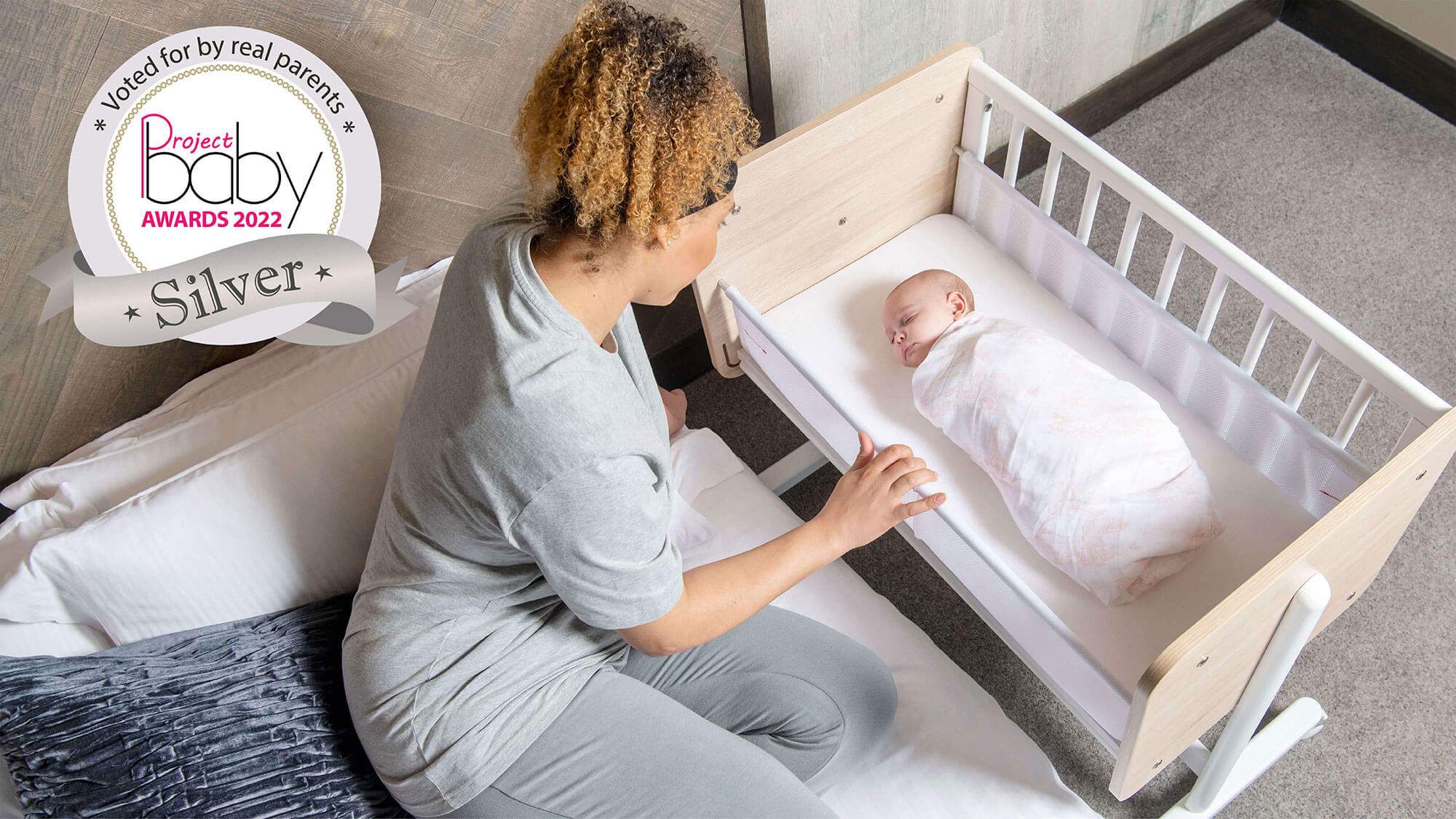 Mum with baby in Neat Bedside Crib