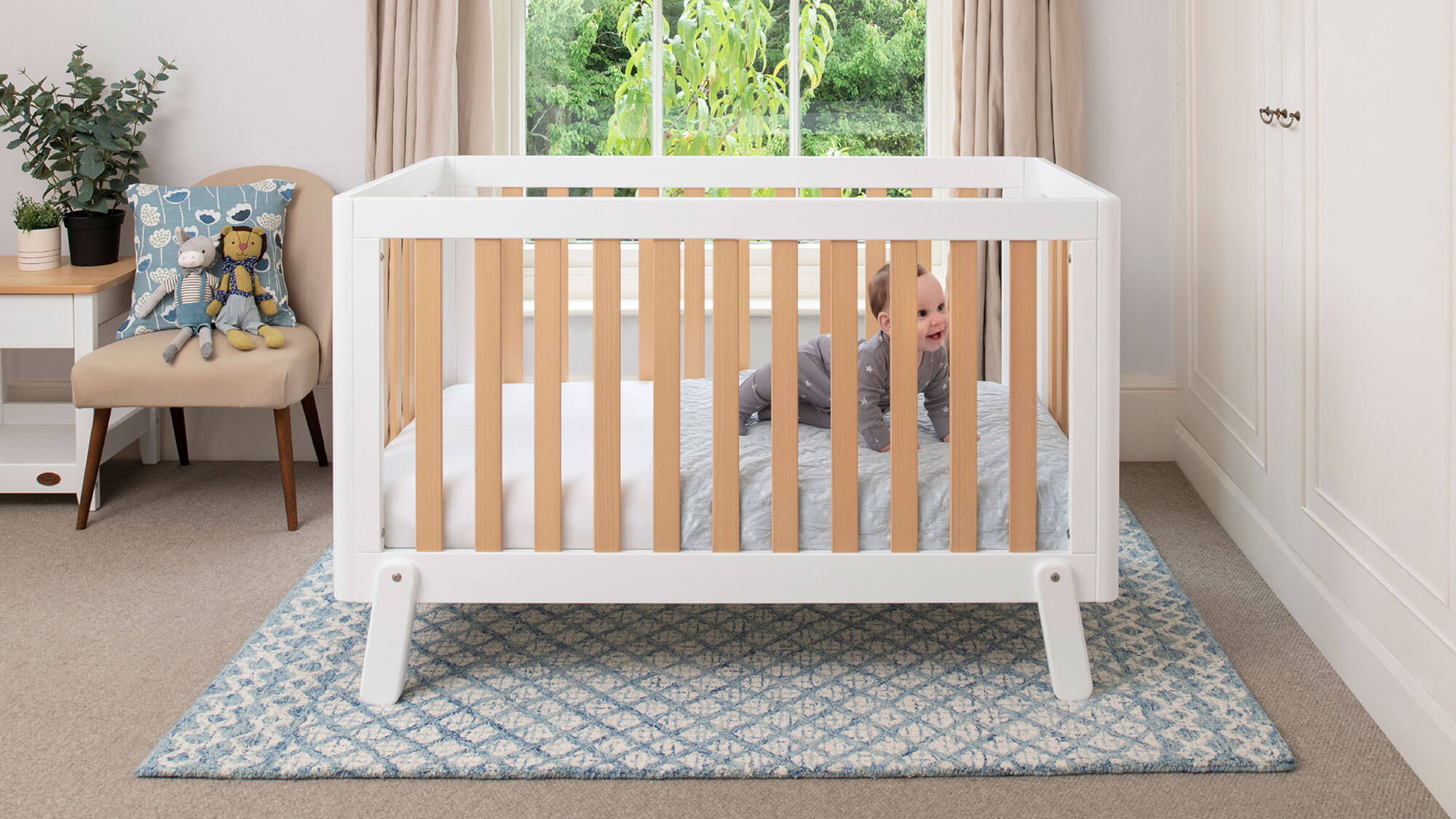 Baby in Boori Turin Cot Bed