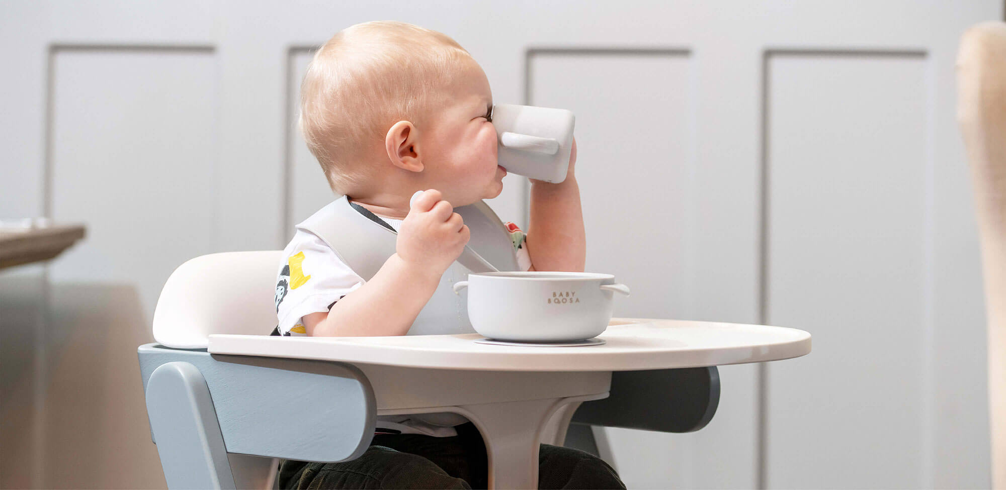 Toddler drinking from cup