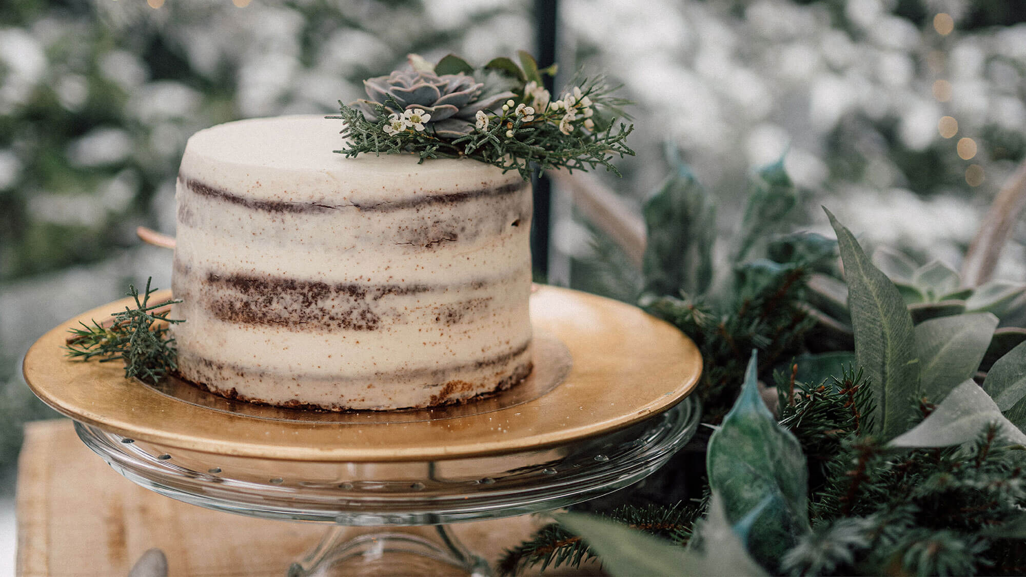 Naked cake with forest foliage