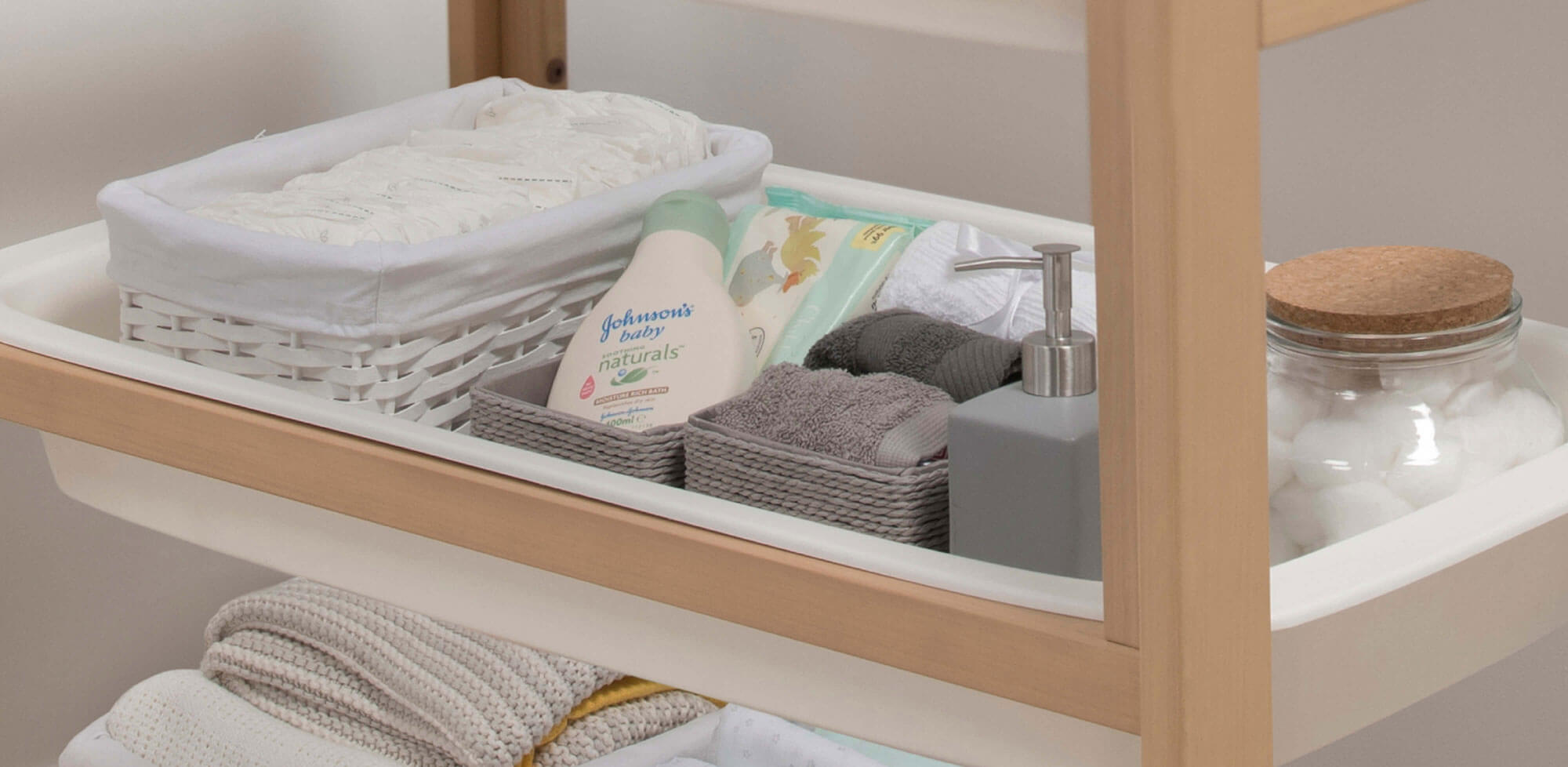 Baby changing items on a shelf