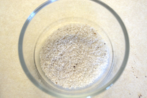 ground minute rice showing coffee residue from dirty coffee grinder